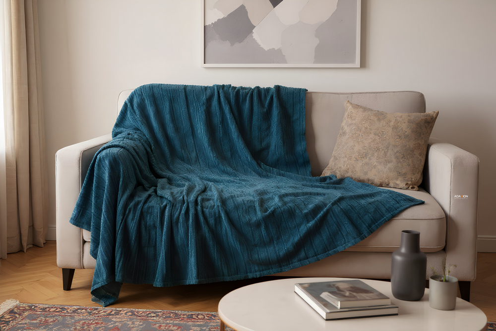 professional photoshoot of sofa throw blanket – textured fabric, detailed pattern, product photography for home textiles